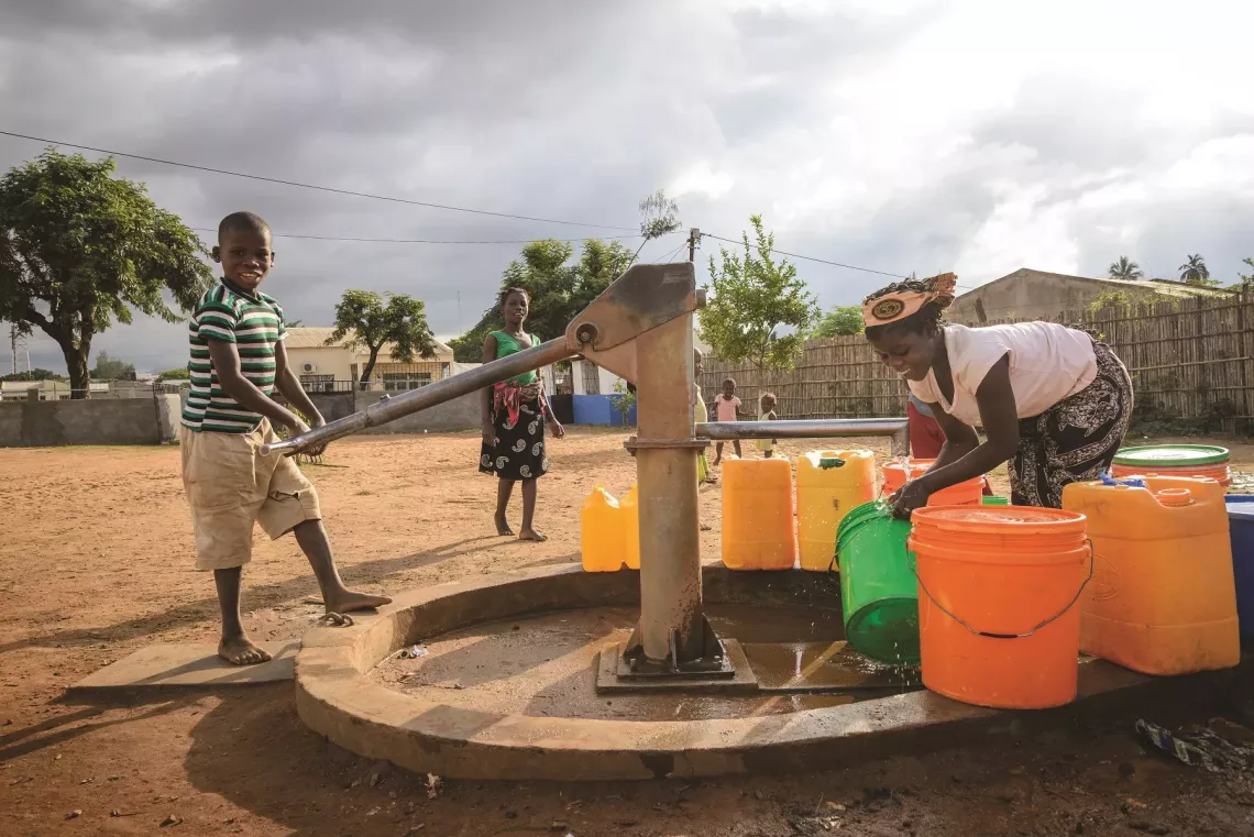 A team drilling a water borehole in a rural community